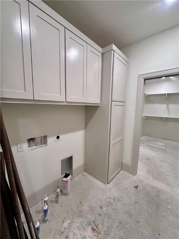 laundry room with cabinet space, washer hookup, and electric dryer hookup