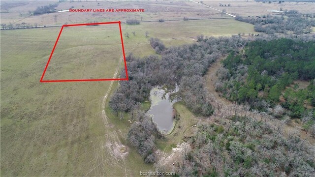 Listing photo 2 for 12.35ACRESLOT13 Hwy 30, Bedias TX 77831