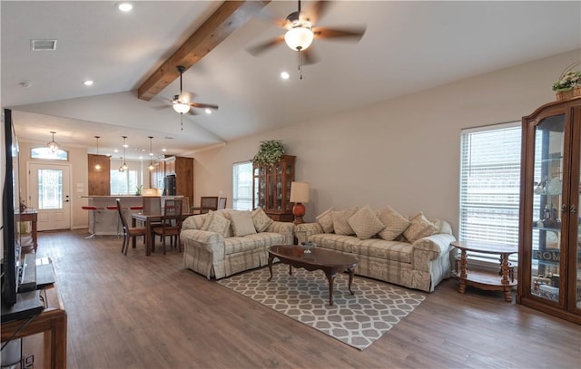 living room featuring vaulted ceiling with beams, ceiling fan, and dark hardwood / wood-style floors