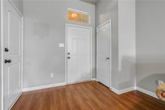 entrance foyer with hardwood / wood-style floors