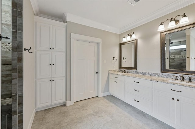 bathroom with vanity, a shower, and ornamental molding