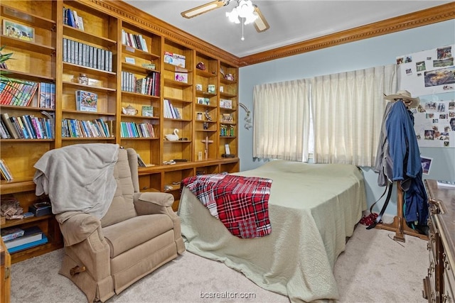 bedroom featuring light colored carpet, ceiling fan, and ornamental molding