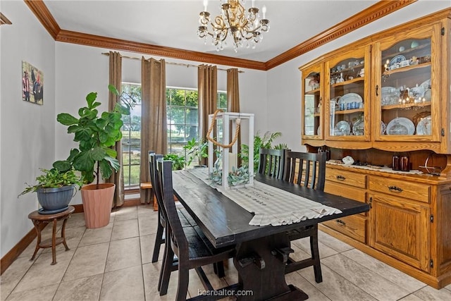 dining area featuring a chandelier, light tile patterned floors, and crown molding