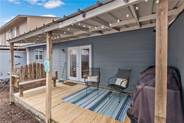 wooden terrace featuring french doors