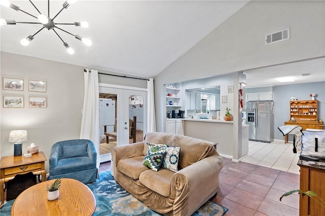 living room with french doors, lofted ceiling, visible vents, light tile patterned flooring, and a chandelier