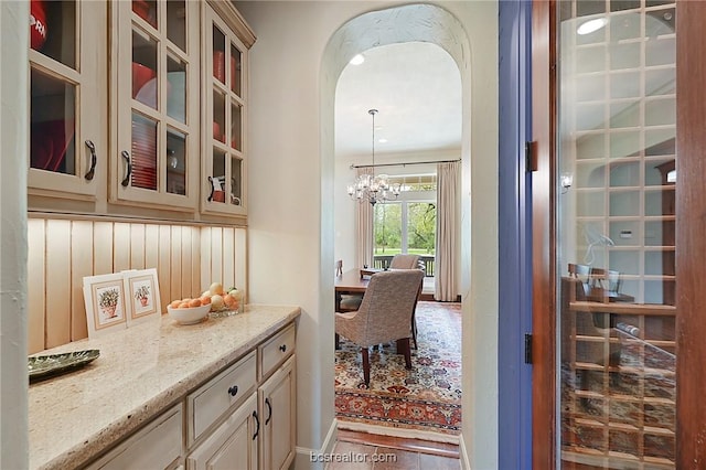 1650 Bird Pond Rd, College Station, TX 77845 - corridor featuring a chandelier and arched walkways