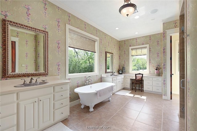 1650 Bird Pond Rd, College Station, TX 77845 - bathroom with ornamental molding, two vanities, tile patterned flooring, a freestanding bath, and wallpapered walls