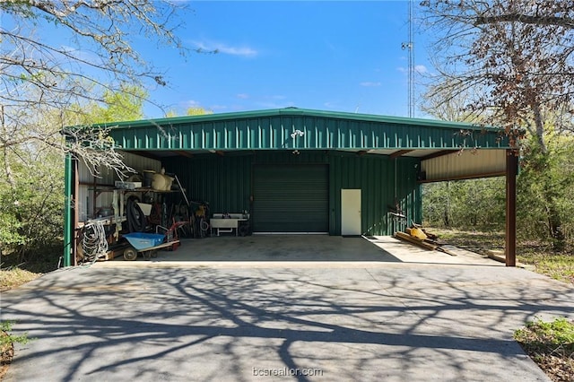 1650 Bird Pond Rd, College Station, TX 77845 - view of outdoor structure with asphalt driveway
