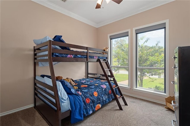 bedroom featuring carpet, ceiling fan, and ornamental molding