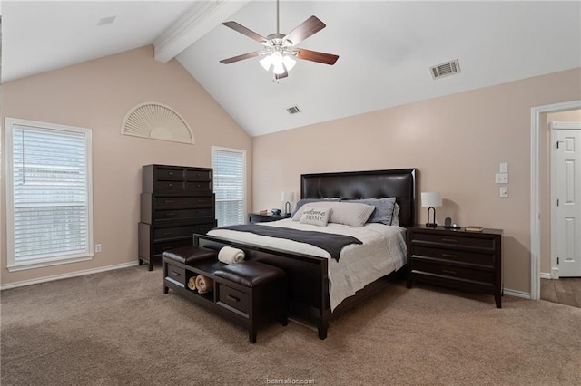 carpeted bedroom with multiple windows, beam ceiling, high vaulted ceiling, and ceiling fan