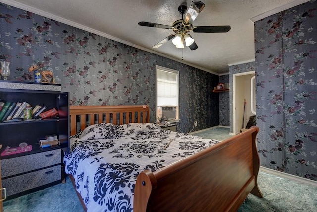 bedroom with ceiling fan, cooling unit, carpet floors, a textured ceiling, and crown molding