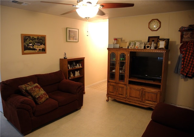 living room featuring ceiling fan