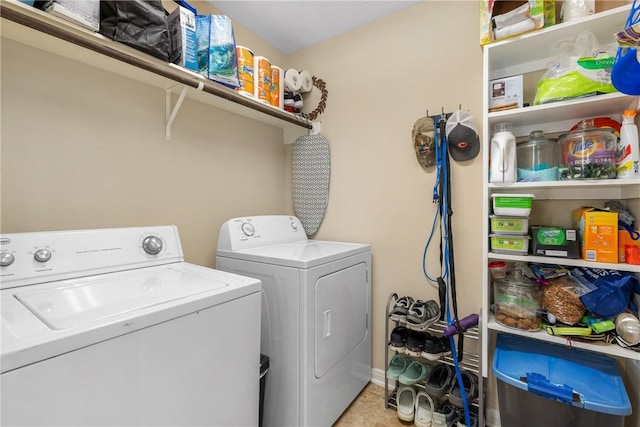 laundry room featuring independent washer and dryer