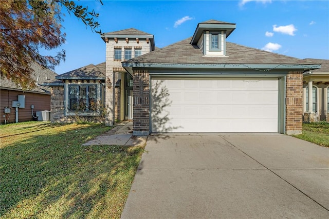 view of front of house featuring central AC, a front lawn, and a garage