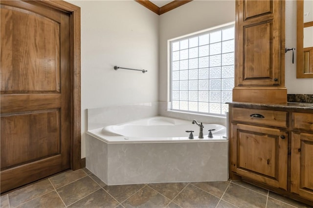 bathroom with vanity, a garden tub, and tile patterned flooring