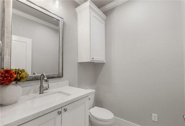 4813 Coopers Hawk Dr, College Station, TX 77845 - bathroom featuring crown molding, vanity, toilet, and baseboards