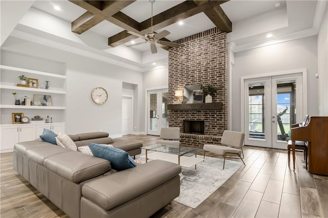 4813 Coopers Hawk Dr, College Station, TX 77845 - living room with french doors, coffered ceiling, ceiling fan, a high ceiling, and beam ceiling