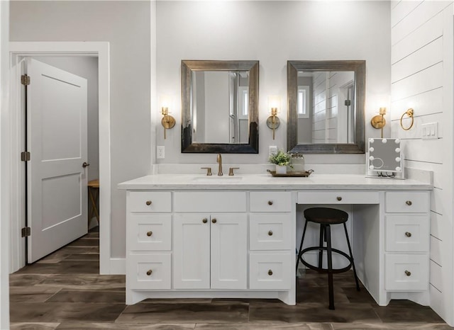 4813 Coopers Hawk Dr, College Station, TX 77845 - bathroom with wood finished floors and vanity