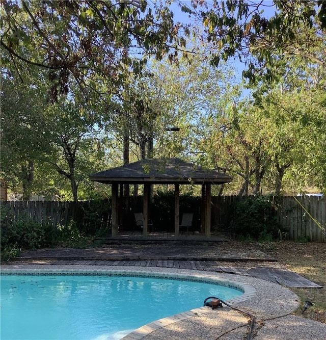 view of swimming pool with a gazebo