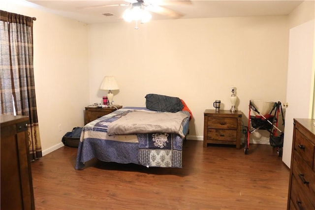 106 N Minden St, Madisonville, TX 77864 - bedroom featuring wood finished floors and ceiling fan