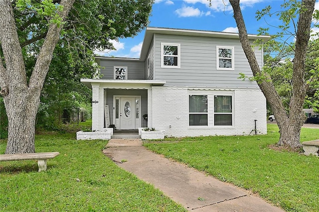 view of front facade with a front lawn