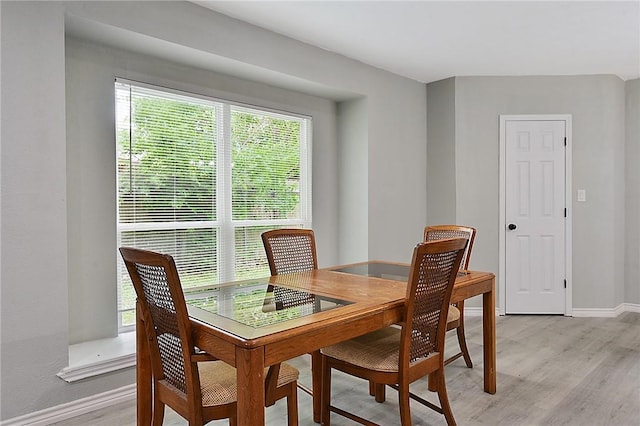 dining room featuring light hardwood / wood-style floors