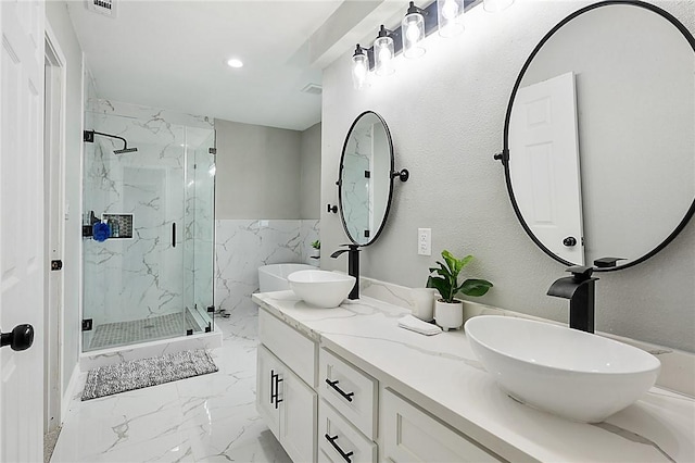 bathroom with vanity and walk in shower