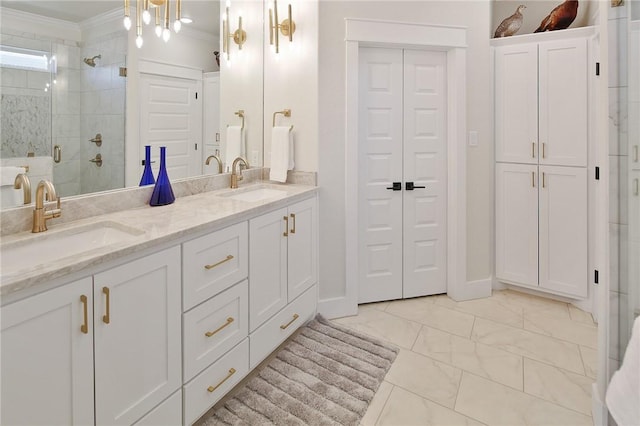 bathroom featuring crown molding, vanity, and walk in shower