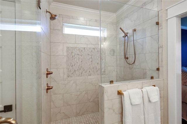 bathroom with ornamental molding and tiled shower