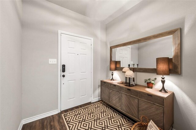 entryway with wood-type flooring