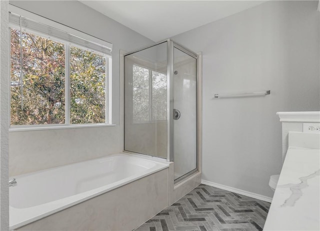 bathroom with separate shower and tub, tile patterned floors, and toilet