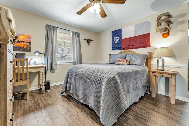 bedroom with hardwood / wood-style floors and ceiling fan