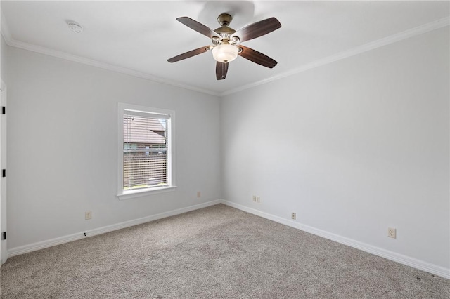 4412 Hearst Ct, College Station, TX 77845 - carpeted spare room with crown molding, a ceiling fan, baseboards, and a smoke detector