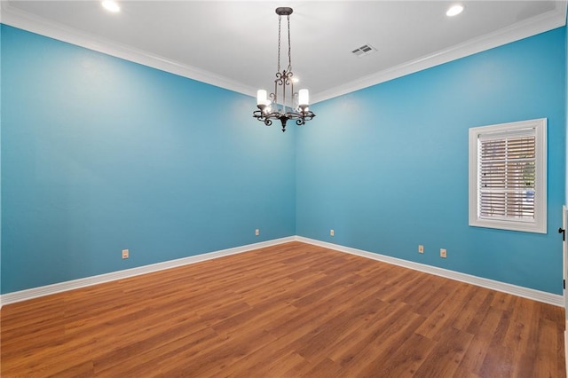 4412 Hearst Ct, College Station, TX 77845 - empty room with a chandelier, ornamental molding, wood finished floors, recessed lighting, and baseboards