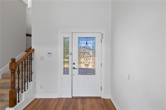 4412 Hearst Ct, College Station, TX 77845 - entrance foyer featuring wood finished floors, baseboards, and stairs