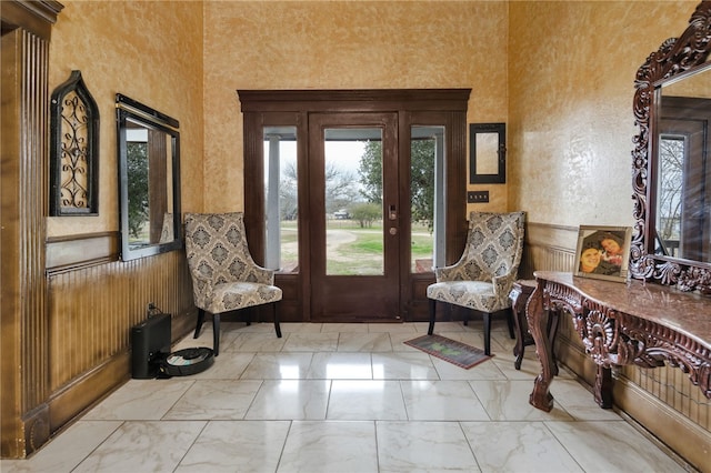 foyer featuring plenty of natural light