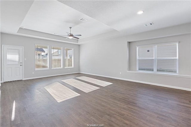 5769 Paseo Pl, Bryan, TX 77807 - unfurnished room with a raised ceiling, ceiling fan, wood finished floors, and recessed lighting