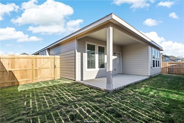 5769 Paseo Pl, Bryan, TX 77807 - back of house featuring a fenced backyard and a patio