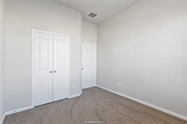 5769 Paseo Pl, Bryan, TX 77807 - unfurnished bedroom featuring carpet and a closet