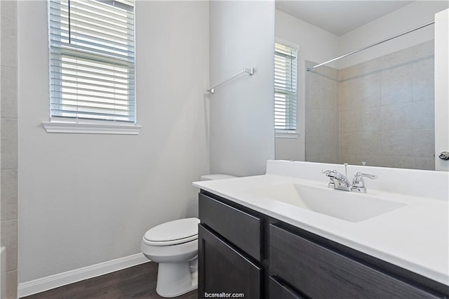 5769 Paseo Pl, Bryan, TX 77807 - full bath featuring wood finished floors, vanity, and a shower