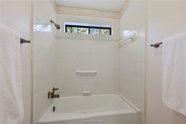 bathroom with shower / bathtub combination with curtain