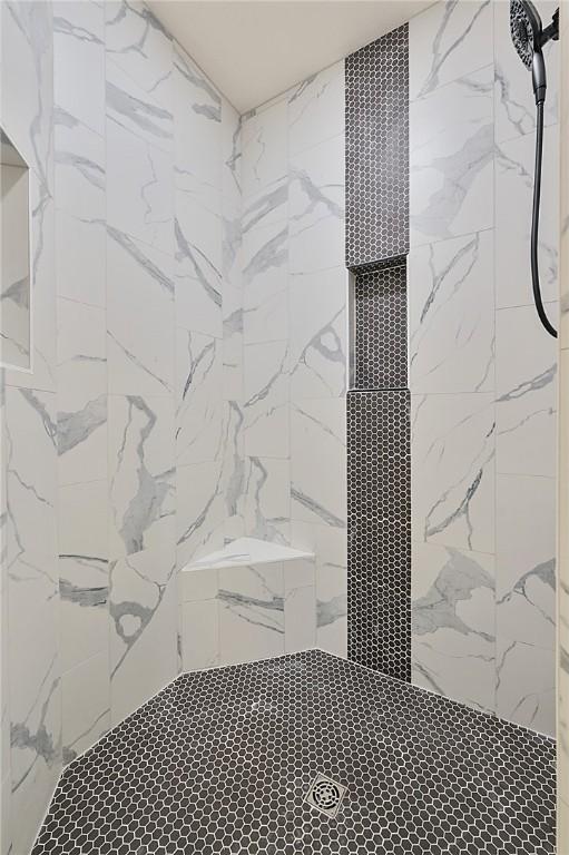 7888 Mathis Creek Dr, Bryan, TX 77808 - full bathroom with a tile shower