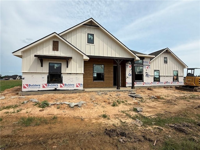 7888 Mathis Creek Dr, Bryan, TX 77808 - property under construction with board and batten siding