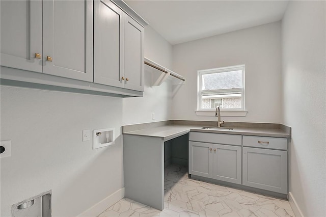 7888 Mathis Creek Dr, Bryan, TX 77808 - laundry room featuring cabinet space, light marble finish flooring, hookup for a washing machine, baseboards, and electric dryer hookup