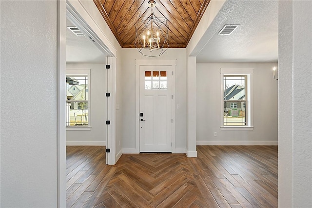 7888 Mathis Creek Dr, Bryan, TX 77808 - foyer entrance with a chandelier and baseboards