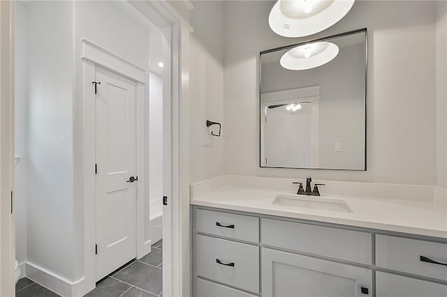 7888 Mathis Creek Dr, Bryan, TX 77808 - full bathroom with vanity, tile patterned flooring, and baseboards