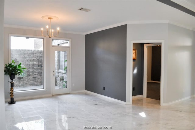 empty room with a notable chandelier and crown molding