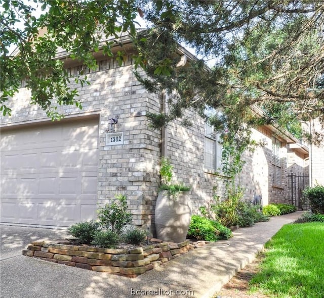 view of property exterior featuring a garage