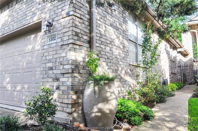 view of home's exterior with a garage