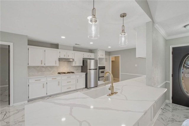 kitchen with marble finish floor, decorative light fixtures, stainless steel appliances, white cabinets, and a sink